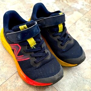 Practically new kids sized 10.5 new balance shoes! Kid grew two months in 😑